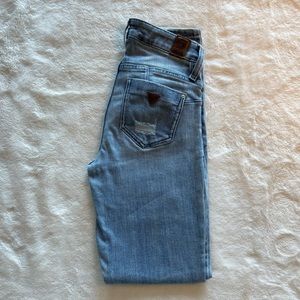 Guess size 25 curved light blue denim worn once